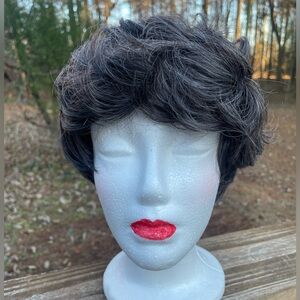 Dark Gray with Gray in it Short Wig for Women. It’s synthetic.